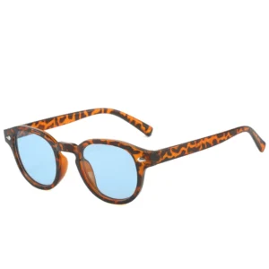 Tortoiseshell frame, blue lenses / إطار بنقشة السلحفاة وعدسات زرقاء