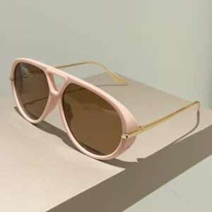Pink frame, brown lenses / إطار وردي وعدسات بنية