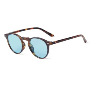 Tortoiseshell frame, turquoise lenses / إطار بني مرقط وعدسات فيروزية