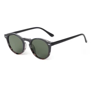 Black and tortoiseshell frame, green lenses / إطار أسود وبني مرقط وعدسات خضراء