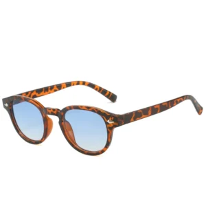 Tortoiseshell frame, blue gradient lenses / إطار بنقشة السلحفاة وعدسات زرقاء متدرجة