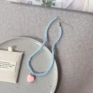 Blue beads, pink heart / خرز أزرق وقلب وردي