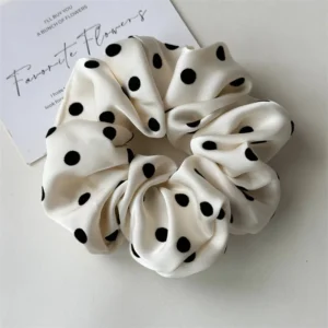 Ivory With Black Dots